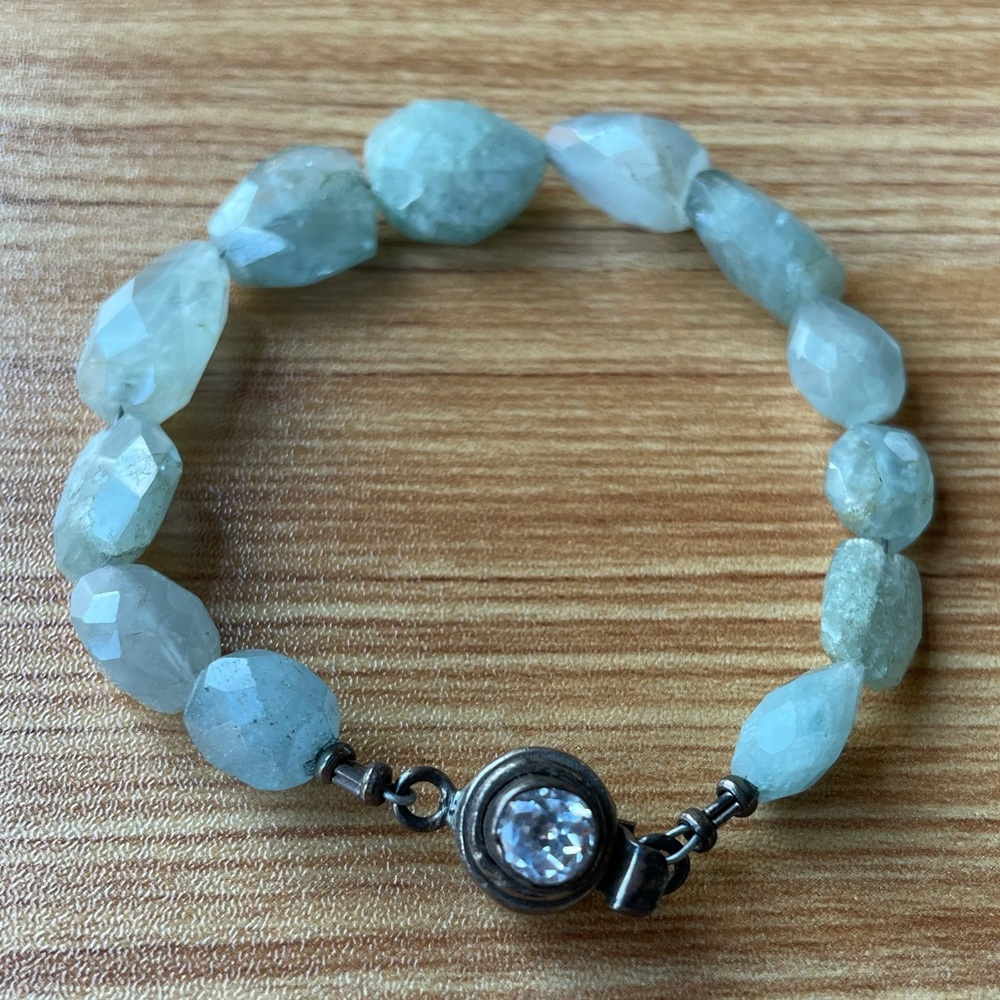 Green stone bracket with crystal clasp